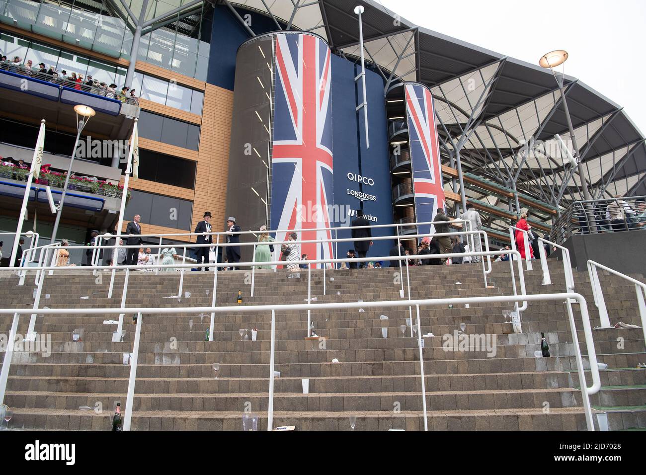 Ascot, Berkshire, UK. 18th June, 2022. The steps around the Parade Ring at Ascot Racecourse as people leave their glasses and bottles behind. Credit: Maureen McLean/Alamy Live News Stock Photo
