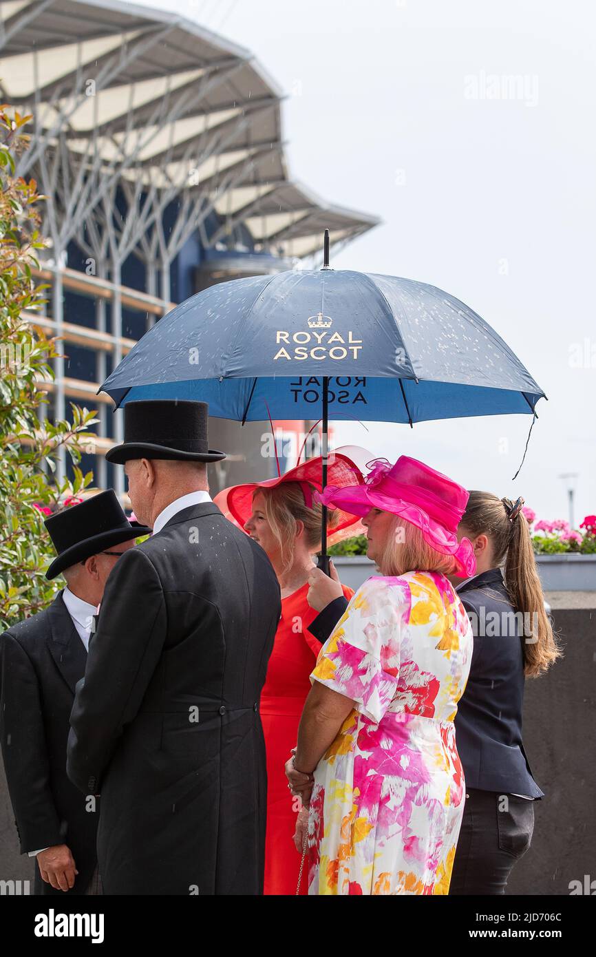 Ascot, Berkshire, UK. 18th June, 2022. It was another day of glamour, hats and umbrellas today on the final day of Royal Ascot. Credit: Maureen McLean/Alamy Live News Stock Photo