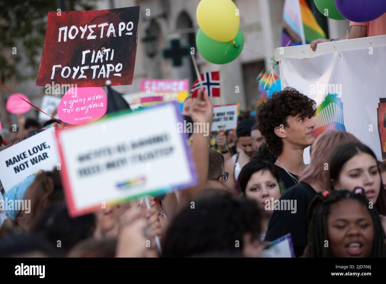 Athens, Greece. 18th June, 2022. People march waving rainbow flags and holding placards, during the Athens Pride anual parade. Thousands demonstrated during the Athens Pride 2022 parade to raise awareness, elevate the visibility of LGBTQ persons in Greek society and defend their rights against sexual discrimination. Credit: Nikolas Georgiou/Alamy Live News Stock Photo