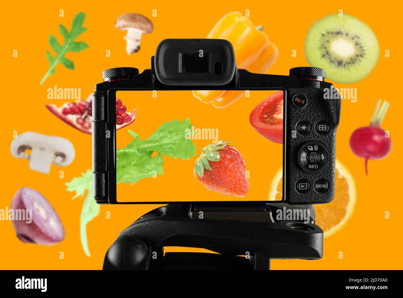 Vlogger records a video of fresh fruit recipe Stock Photo Alamy