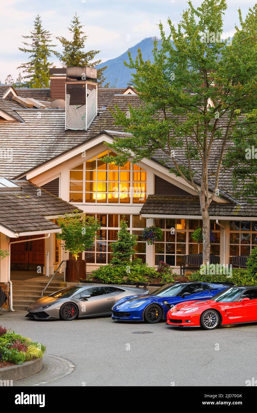 Snoqualmie, WA, USA - June 16, 2022; Three luxury sports cars parked outside the Salish Lodge and Spa in Snoqualmie Washington Stock Photo