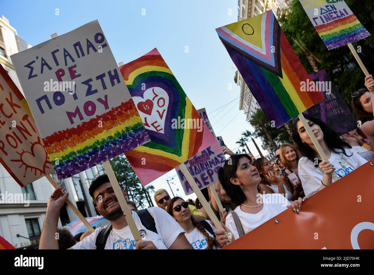 Athens, Greece. 18th June, 2022. People march waving rainbow flags and ...