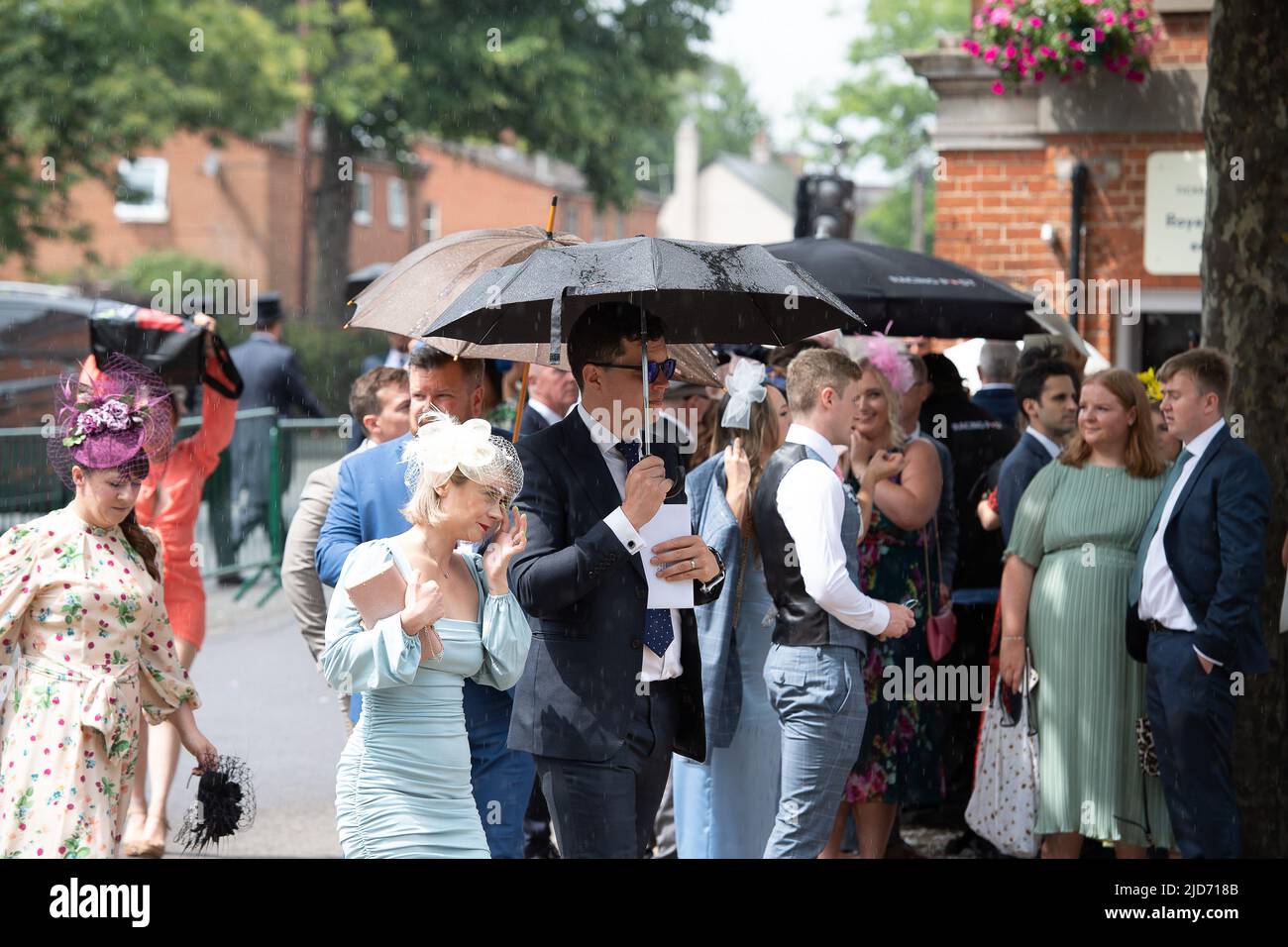 Ascot, Berkshire, UK. 18th June, 2022. It was another day of glamour, hats and umbrellas today on the final day of Royal Ascot. Credit: Maureen McLean/Alamy Live News Stock Photo