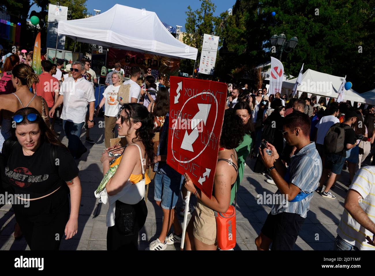 Athens, Greece. 18th June, 2022. People march waving rainbow flags and ...