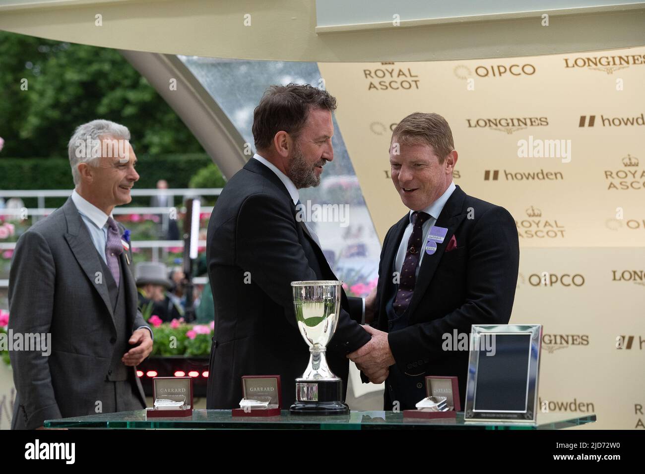 Ascot, Berkshire, UK. 18th June, 2022. Horse Missed the Cut ridden by jockey James McDonald won the Golden Gates Stakes race at Royal Ascot today. Owner Ed Babington. Trainer George Boughey. Comedian Lee Mack who appears in the comedy Not Going Out made the presentation to the winning owners and trainer. Credit: Maureen McLean/Alamy Live News Stock Photo