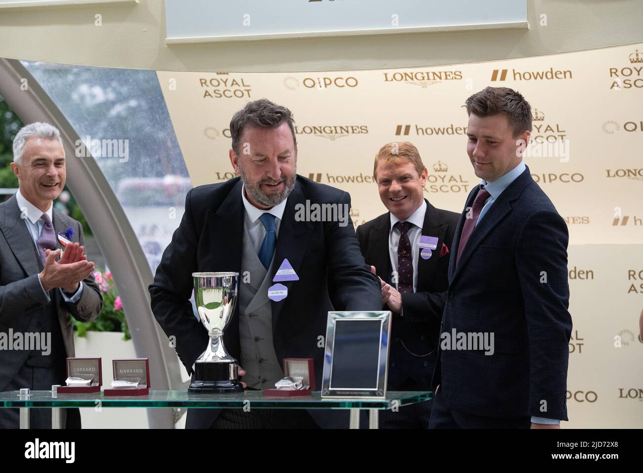 Ascot, Berkshire, UK. 18th June, 2022. Horse Missed the Cut ridden by jockey James McDonald won the Golden Gates Stakes race at Royal Ascot today. Owner Ed Babington. Trainer George Boughey. Comedian Lee Mack who appears in the comedy Not Going Out made the presentation to the winning owners and trainer. Credit: Maureen McLean/Alamy Live News Stock Photo