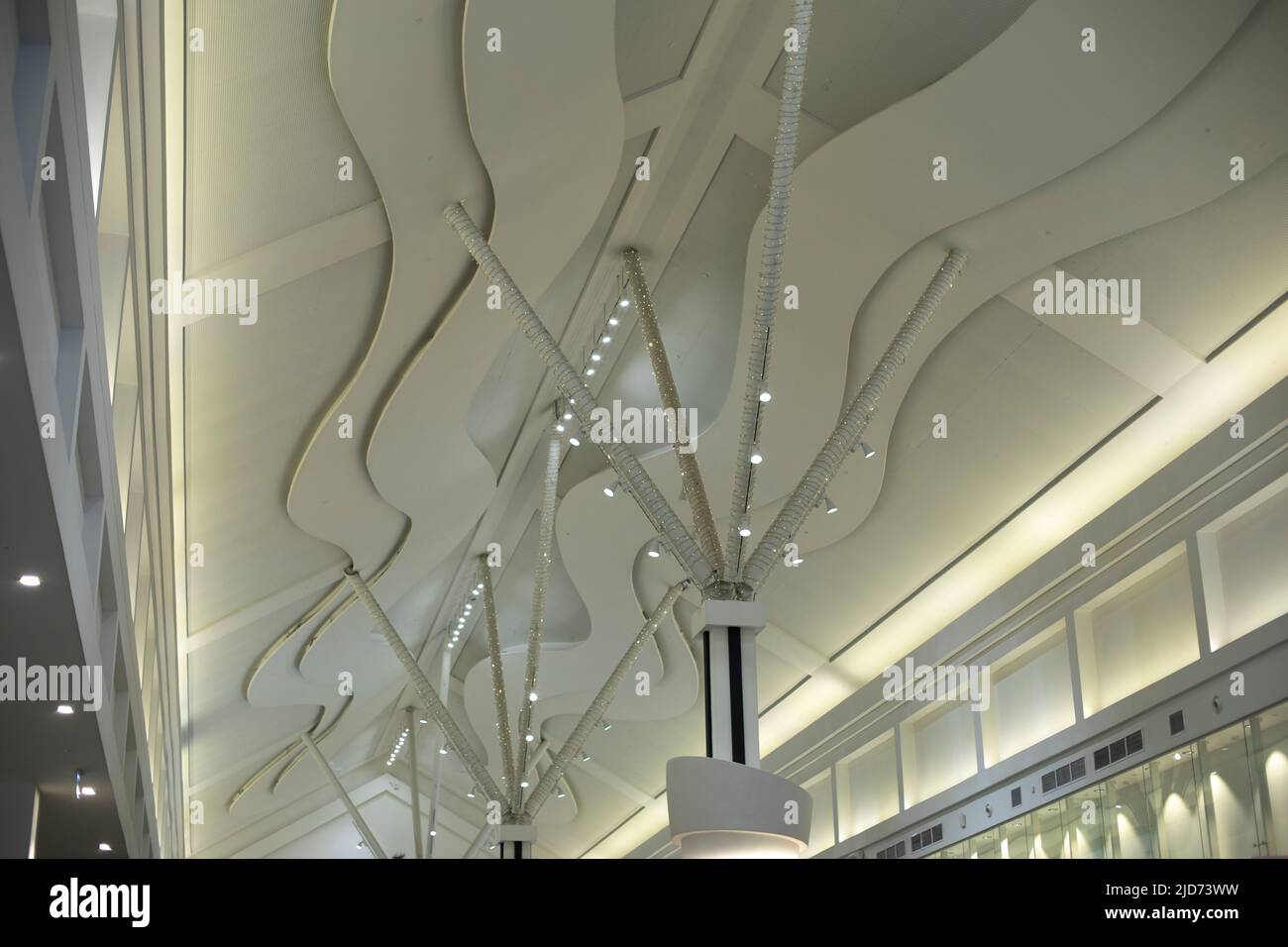 Ceiling in mall. Details of ceiling in large building. Modern architecture. Interior of shopping center. Stock Photo