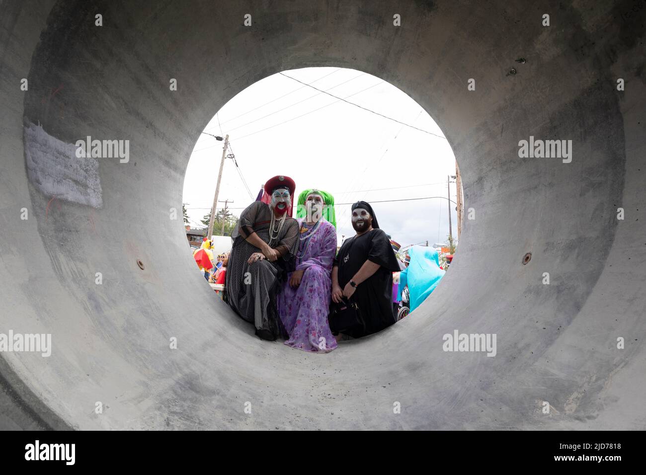 Seattle, Washington, USA. 18th June, 2022. Members of the Sisters of Perpetual Indulgence pose for a photo in an unfinished culvert at the Fremont Solstice Parade. The iconic, annual parade returned after a three-year hiatus due to the coronavirus pandemic. Credit: Paul Christian Gordon/Alamy Live News Stock Photo