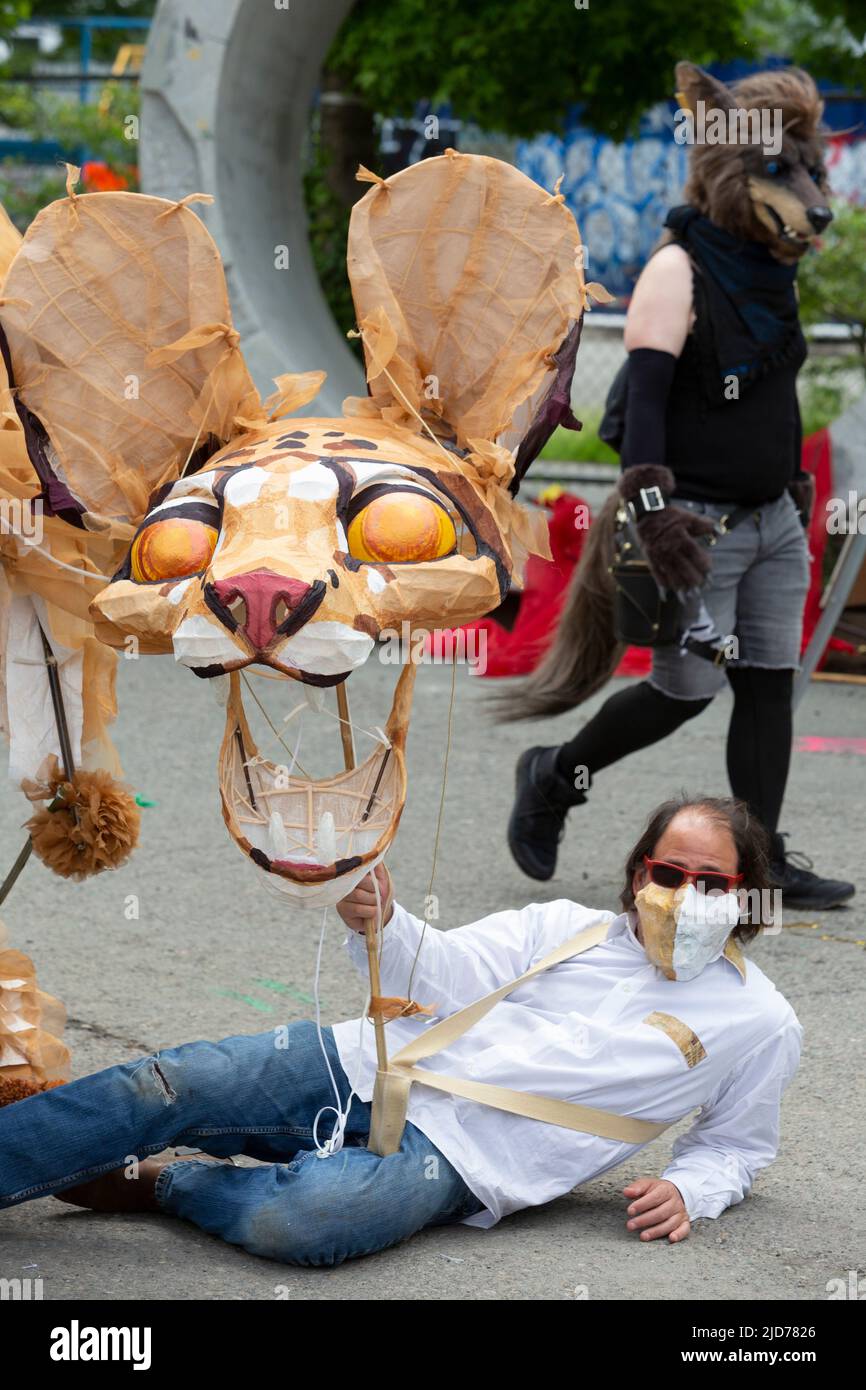 Seattle, Washington, USA. 18th June, 2022. Members of the Clouded Leopard ensemble wait for the Fremont Solstice Parade to begin. The iconic, annual parade returned after a three-year hiatus due to the coronavirus pandemic. Credit: Paul Christian Gordon/Alamy Live News Stock Photo