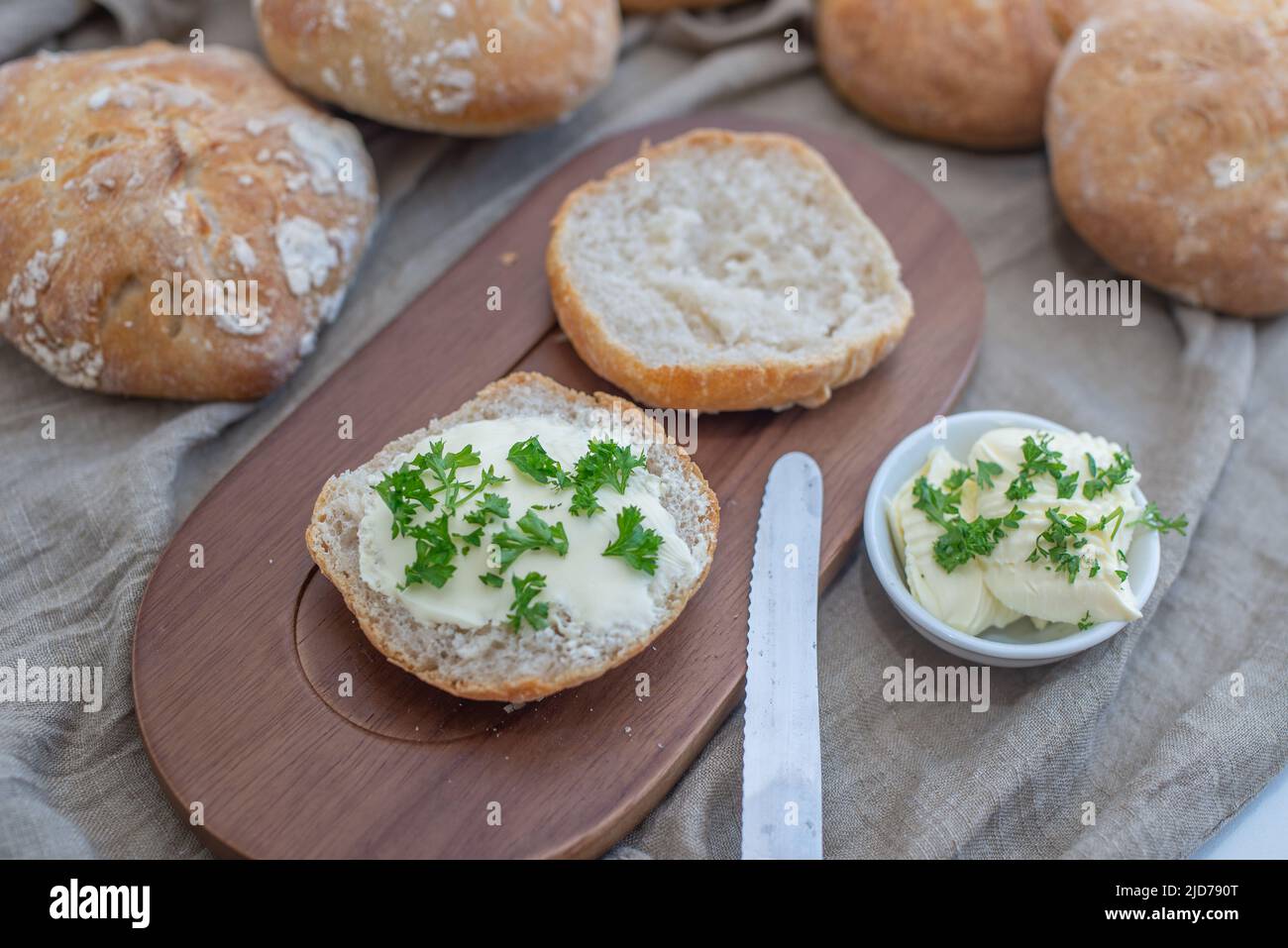 Crusty round bread rolls Stock Photo