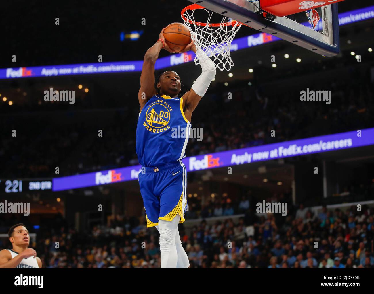 Golden State Warriors forward Jonathan Kuminga dunks the ball against the Memphis  Grizzlies in the second quarter of Game 1 of a second-round playoff series  at the FedEx Forum in Memphis, Tennessee