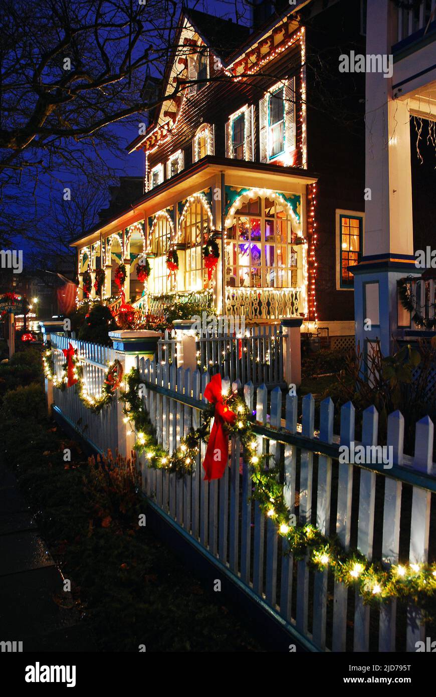 Pretty Victorians are decorated for the Christmas Season in Cape May New Jersey Stock Photo