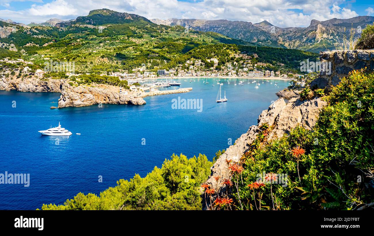 Panorama of Port Soller Mallorca with mountain peak Puig de la Bassa, marin...