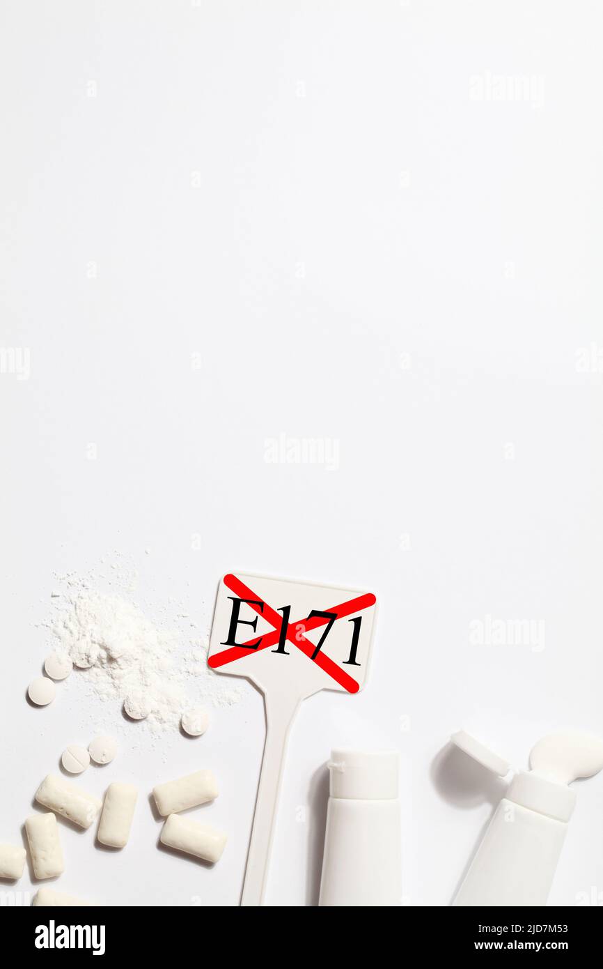 Titanium dioxide, E171, dangerous additive concept. gum, pills ...