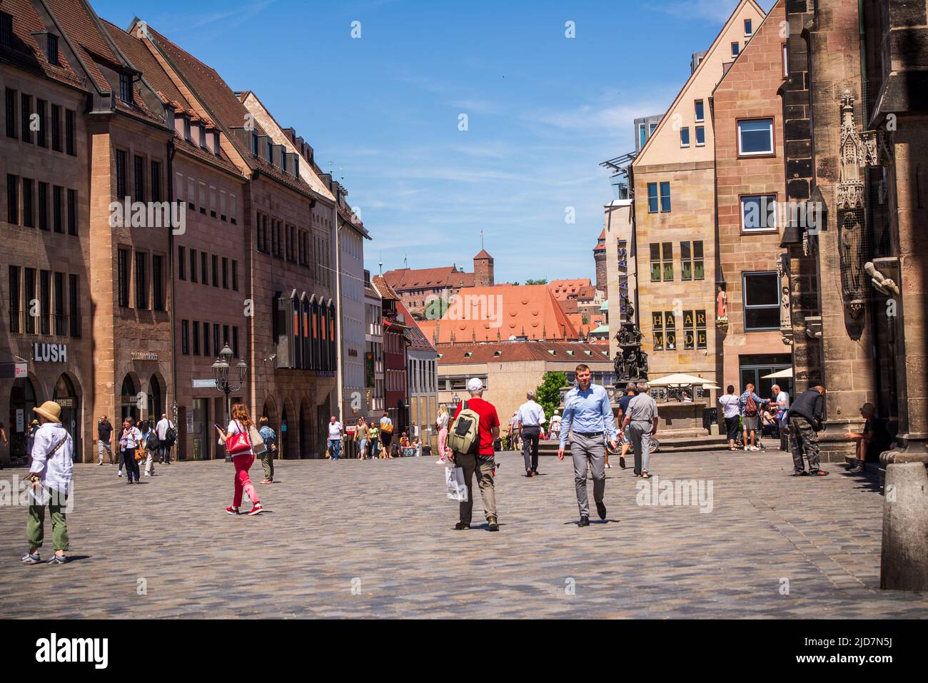 Nuremberg, Germany- June 15,2022: People walk at noon in downtown