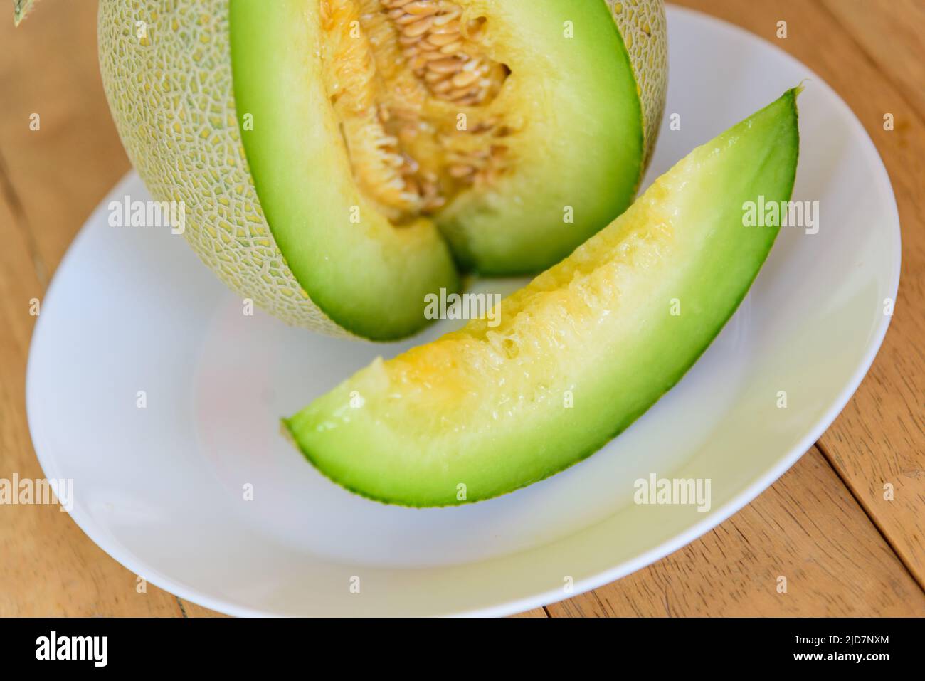 Peel cantaloupe melon in hi-res stock photography and images - Alamy