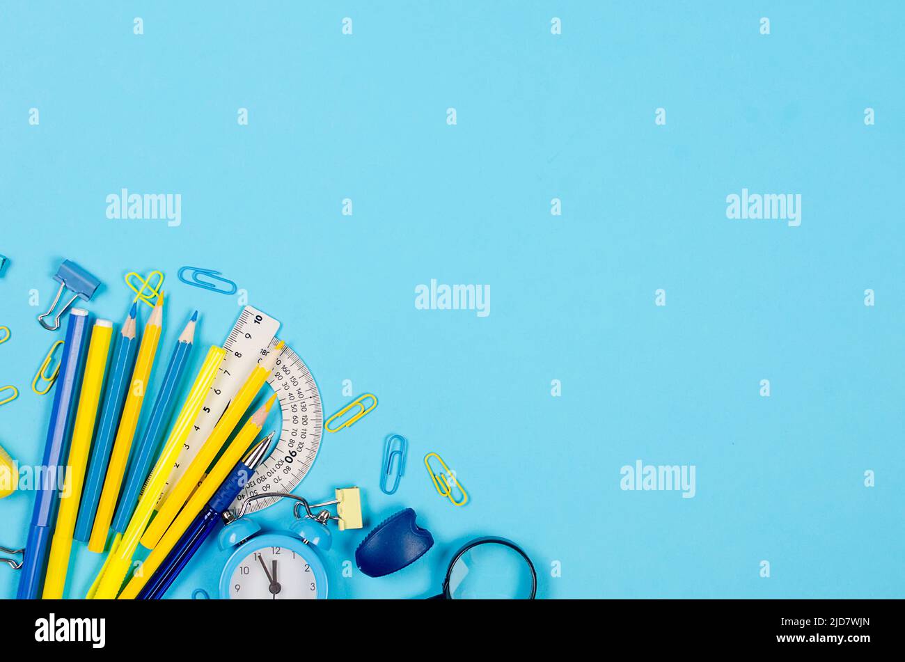 School Color Blue Blue and yellow school stationery on blue background. Supplies for ...