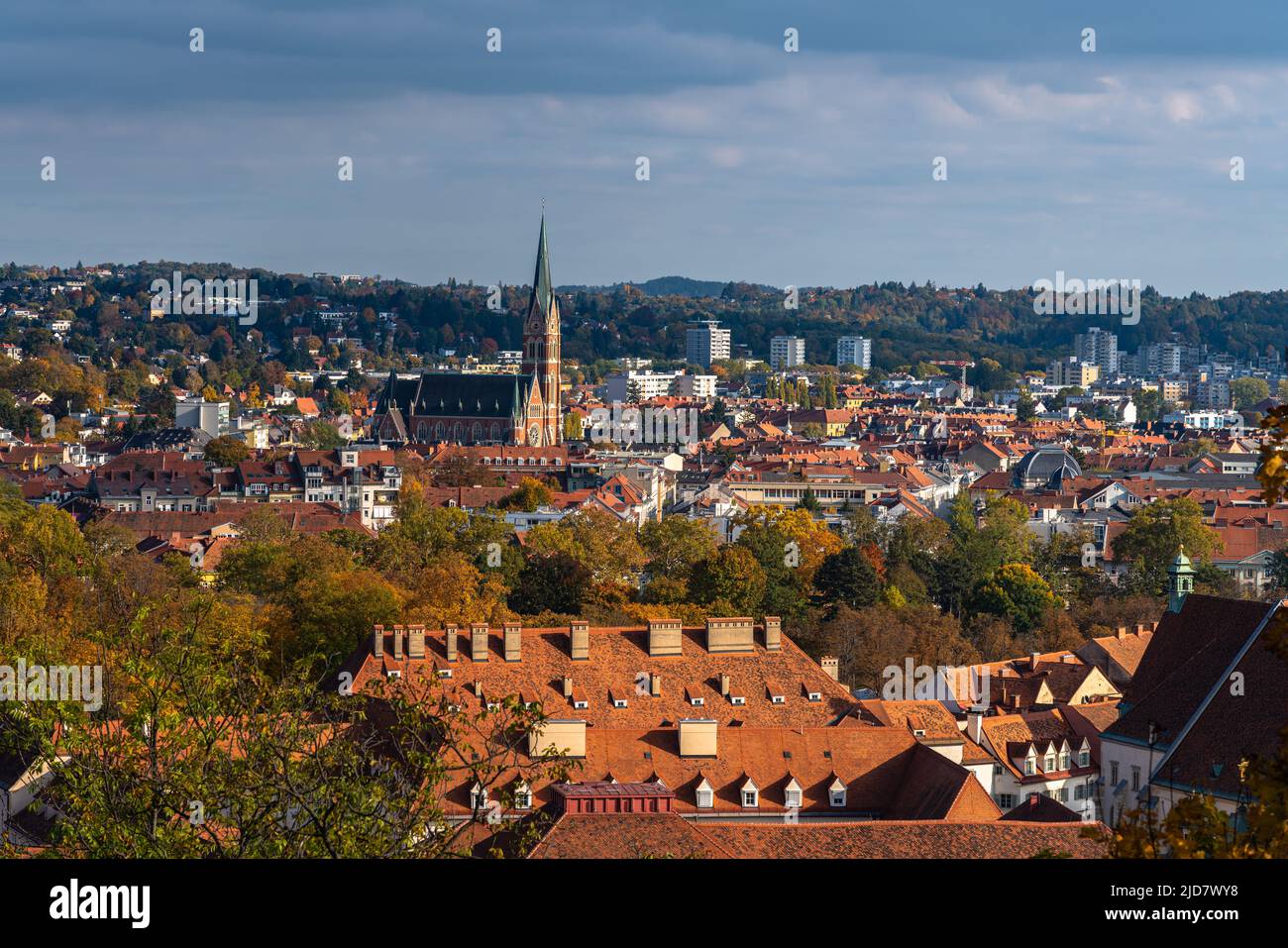 Aerial panorama view of Graz city old town from Schlossberg on a sunny day in autumn, with the Church of the Sacred Heart of Jesus (Herz-Jesu-Kirche) Stock Photo