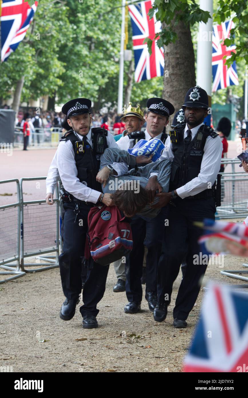 Animal Rebellion protesters tackled by police at Trooping the Colour after running into jubilee parade Stock Photo