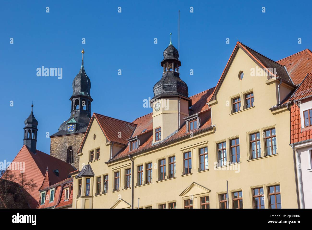 Towers of the town hall and Jacobi church in Hettstedt, Germany Stock Photo