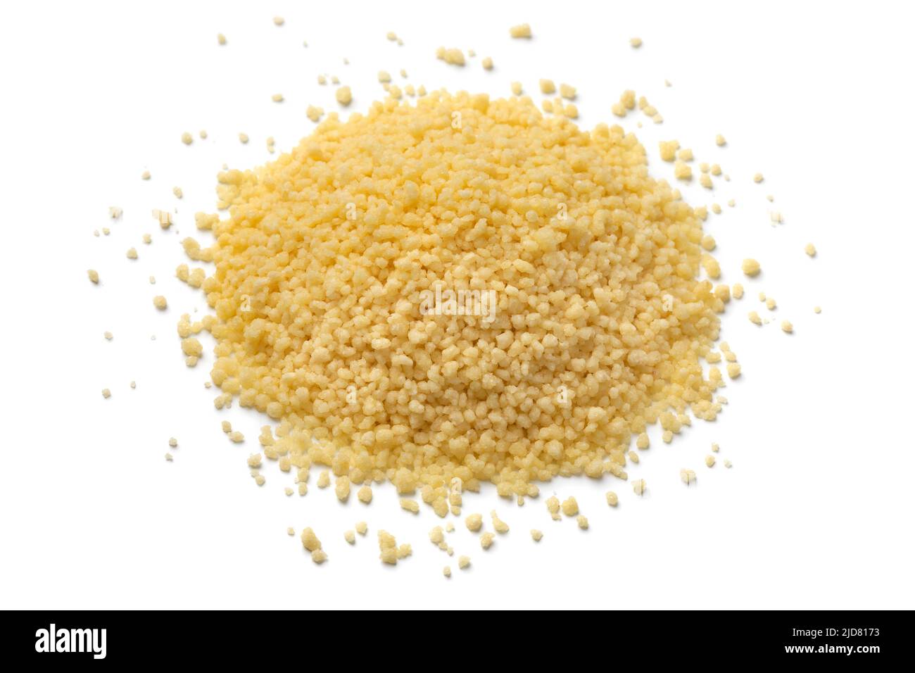 Heap of dried uncooked couscous isolated on white background Stock Photo