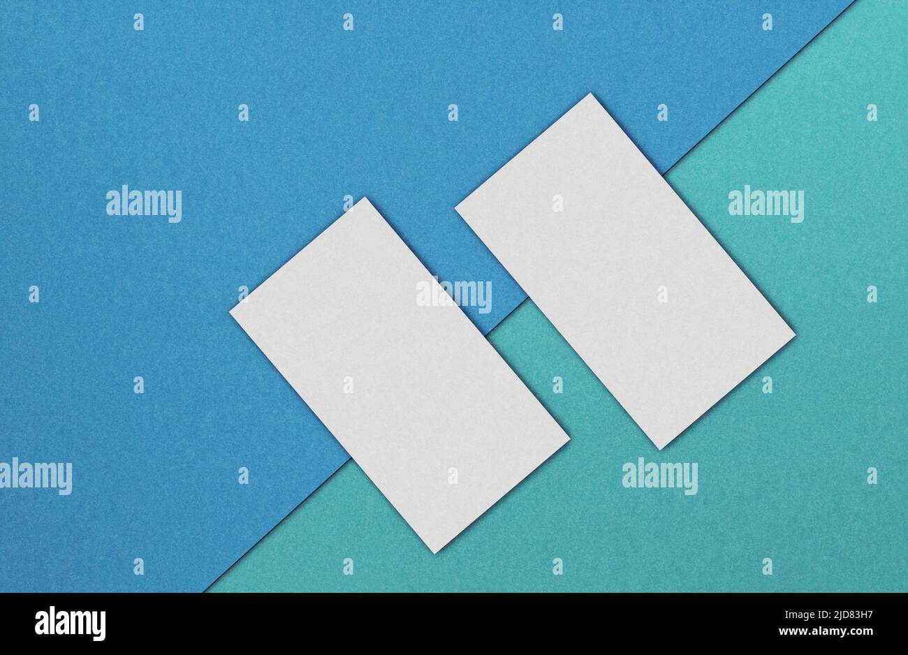 White pages above colour paper texture. Vivid colour background for