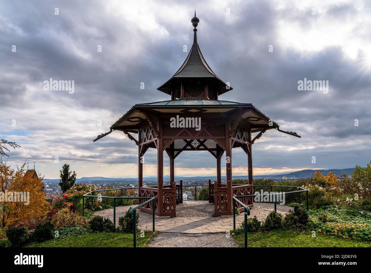Beautiful view of Chinese Pavilion on Schlossberg in Graz with cityscape of Graz old town in background on autumn day, Graz, Austria Stock Photo