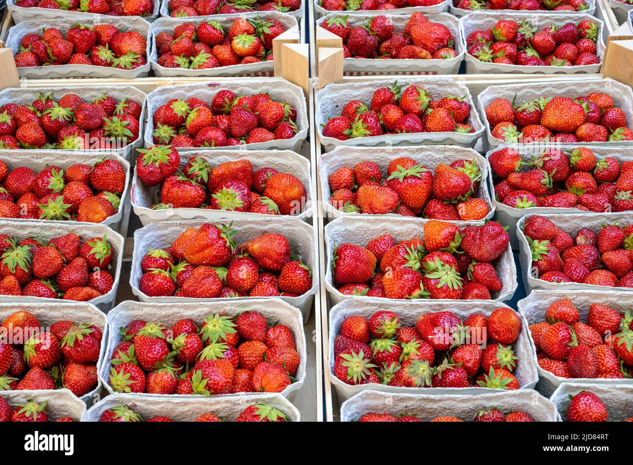 Fresh red strawberries for sale at a market Stock Photo Alamy