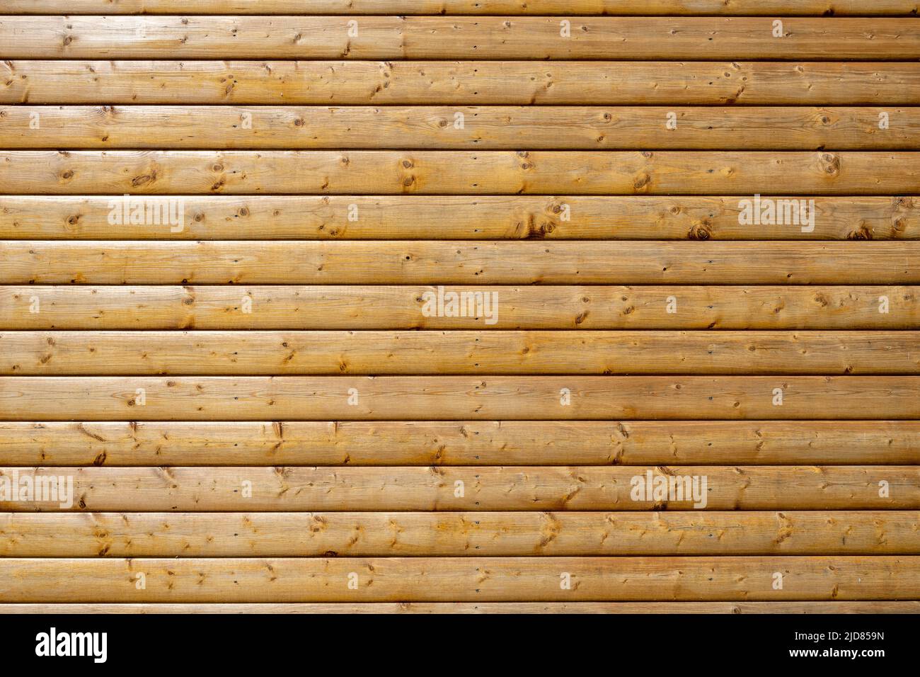 Background from a wall made of painted brown wooden planks Stock Photo