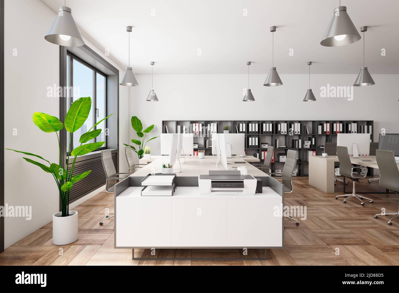 Side view on stylish white and grey work places with modern computers