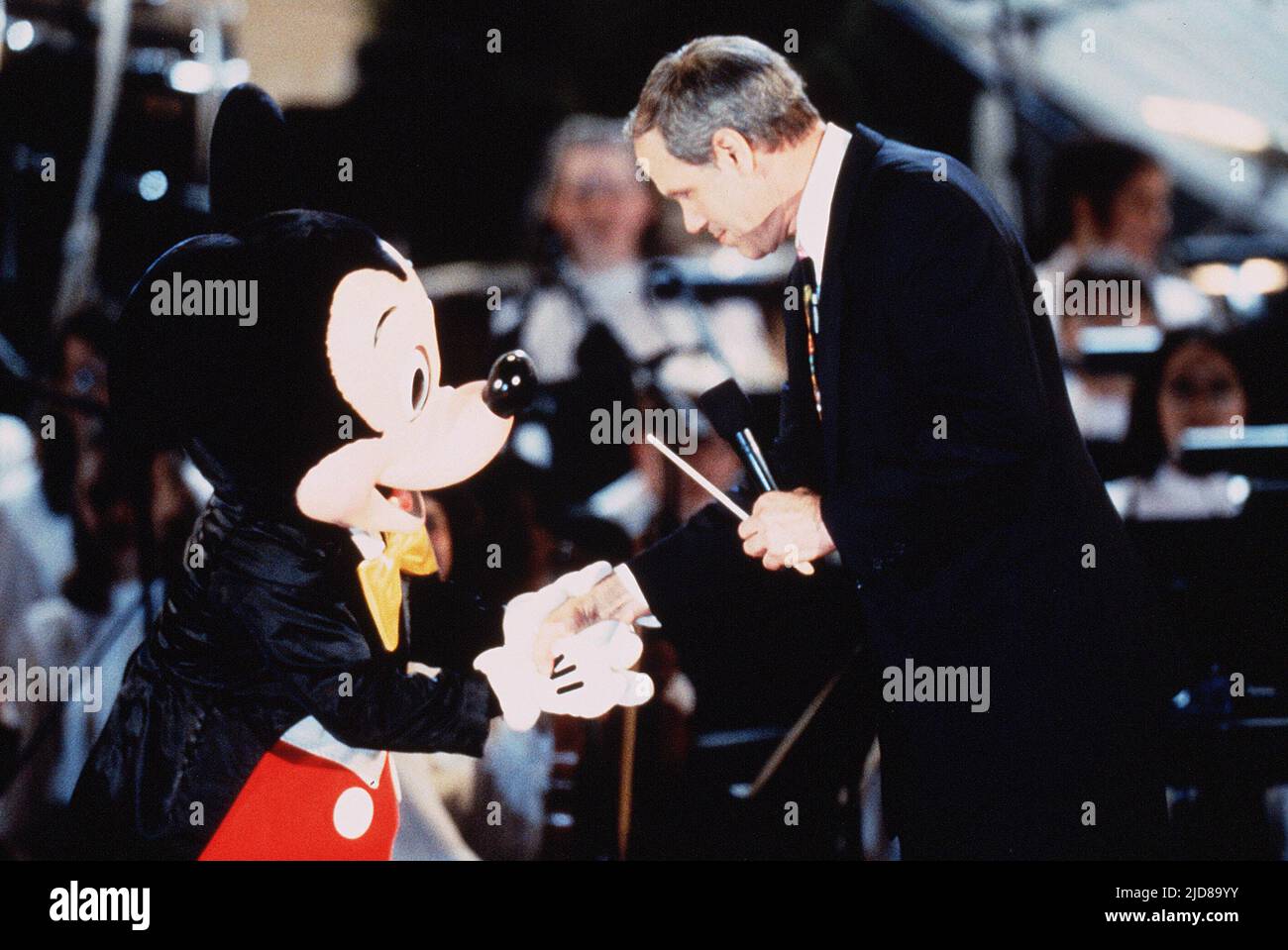 MOUSE,EISNER, DISNEY'S YOUNG MUSICIANS' SYMPHONY ORCHESTRA, 1998 Stock Photo