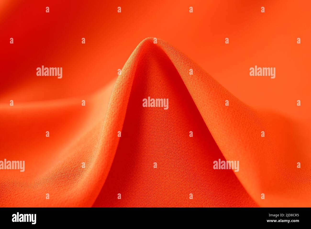 Bright orange fabric background, cotton cloth texture Stock Photo