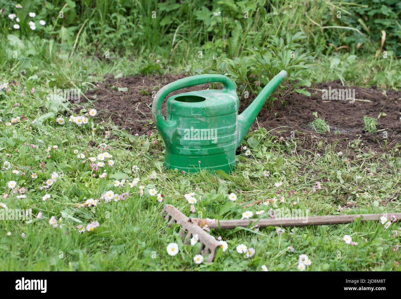 Spring seasonal gardening rake hi-res stock photography and images - Alamy
