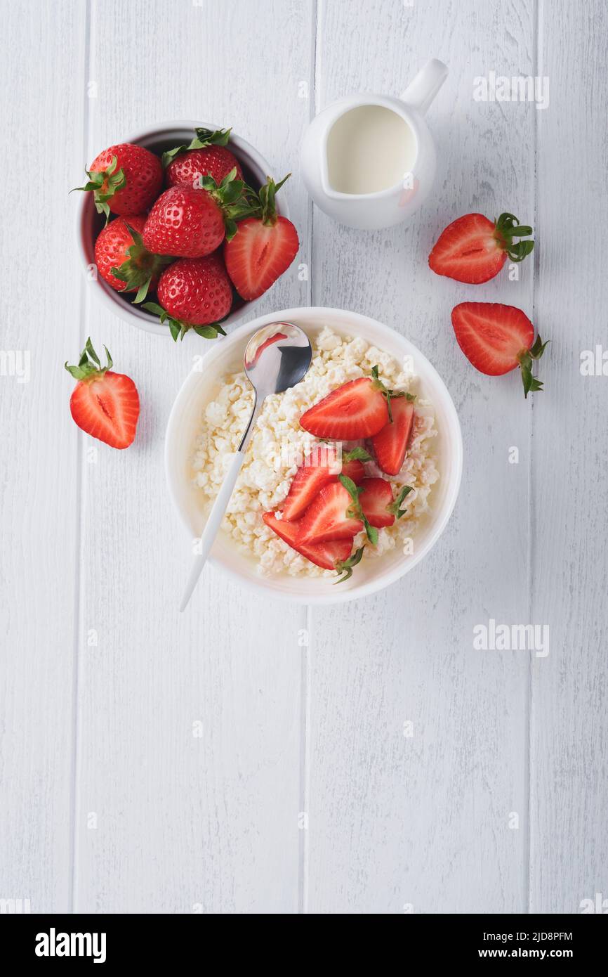 Cottage cheese with strawberries. Breakfast from cottage cheese with