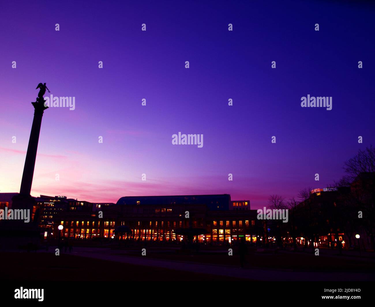 Street of the Kings. Silhouette and colorful view of Stuttgart Koenigstrasse by night. Stock Photo