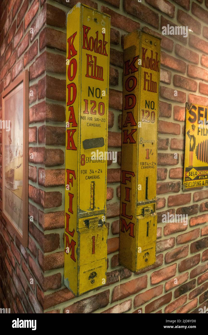 A pair of wall mounted Kodak Film No. 120 roll fim dispensers on display in a media museum. Stock Photo