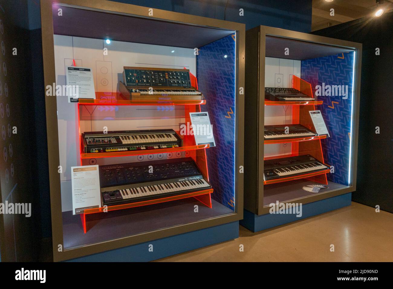 General display of electronic keyboards (synthesizer) on display in a media museum. Stock Photo