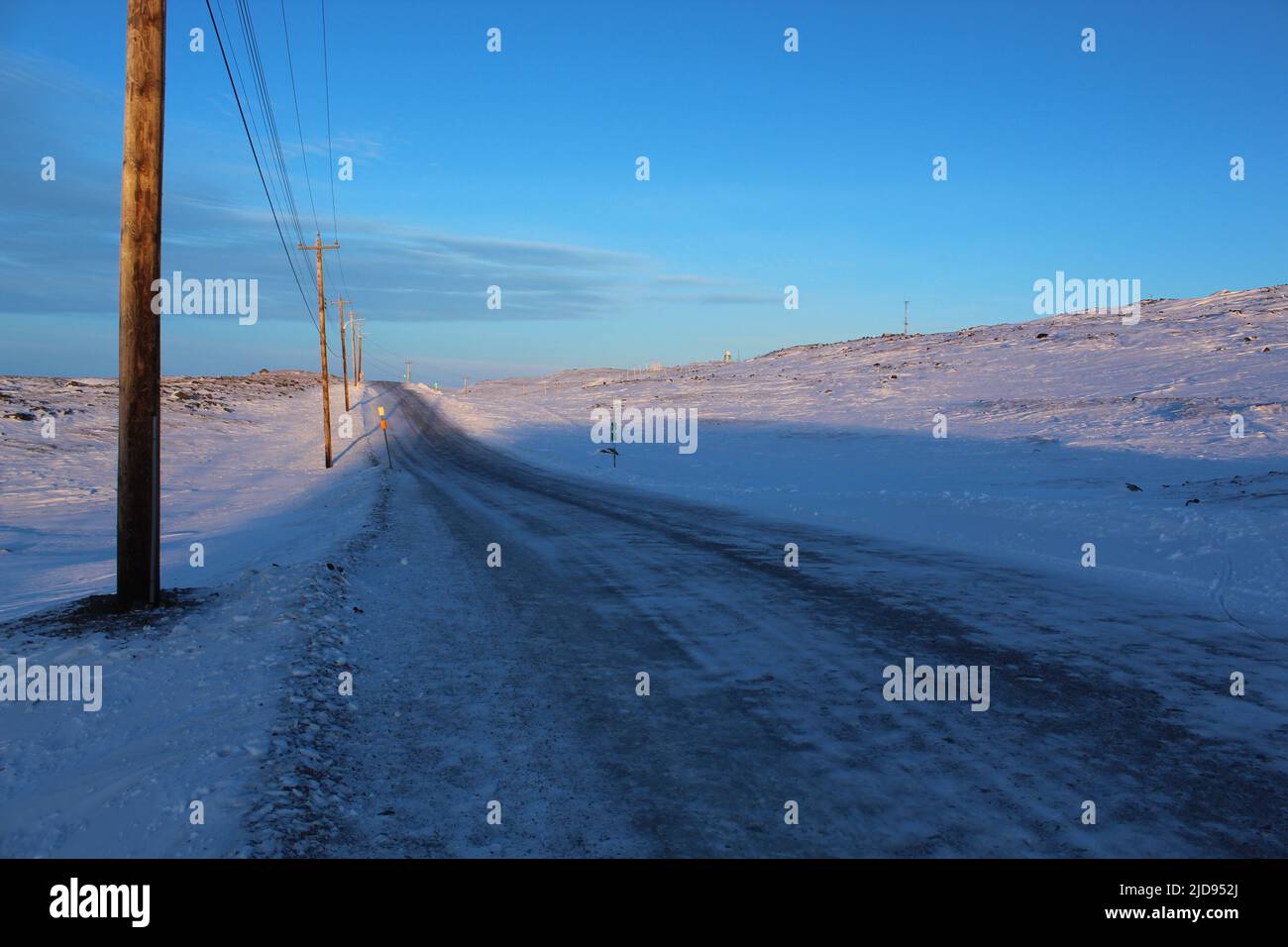 Road through the arctic tundra in Iqaluit, Nunavut, Canada Stock Photo