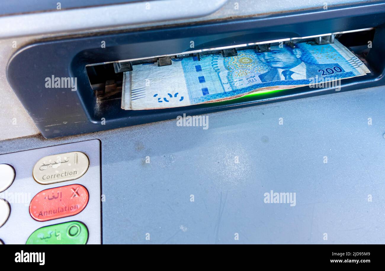 Moroccan Dirham bank notes withdrawn from an ATM machine, Marrakech, Morocco Stock Photo