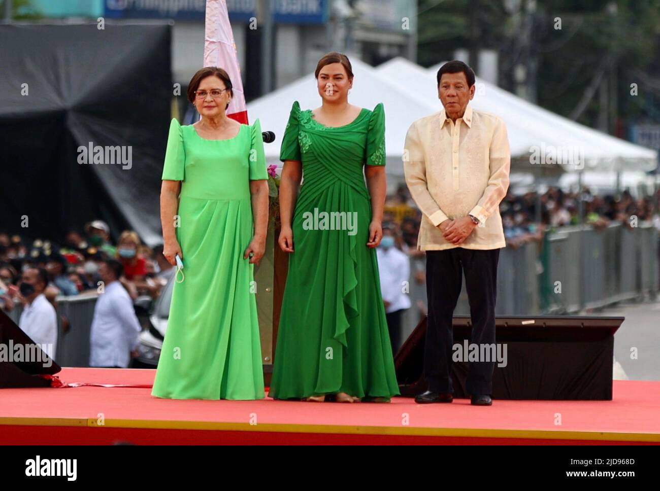 (220619) -- DAVAO CITY, June 19, 2022 (Xinhua) -- Sara Duterte-Carpio (C) poses for photos with her father President Rodrigo Duterte and her mother Elizabeth after taking her oath of office as the 15th vice president of the Philippines in Davao City in the southern Philippines, June 19, 2022. A lawyer and former mayor of Davao City, Duterte-Carpio will officially assume office on June 30. Her six-year term ends on June 30, 2028. Duterte-Carpio won by garnering 32.2 million votes, the highest number of votes from all national candidates, in the May 2022 elections and about twice the 16. Stock Photo