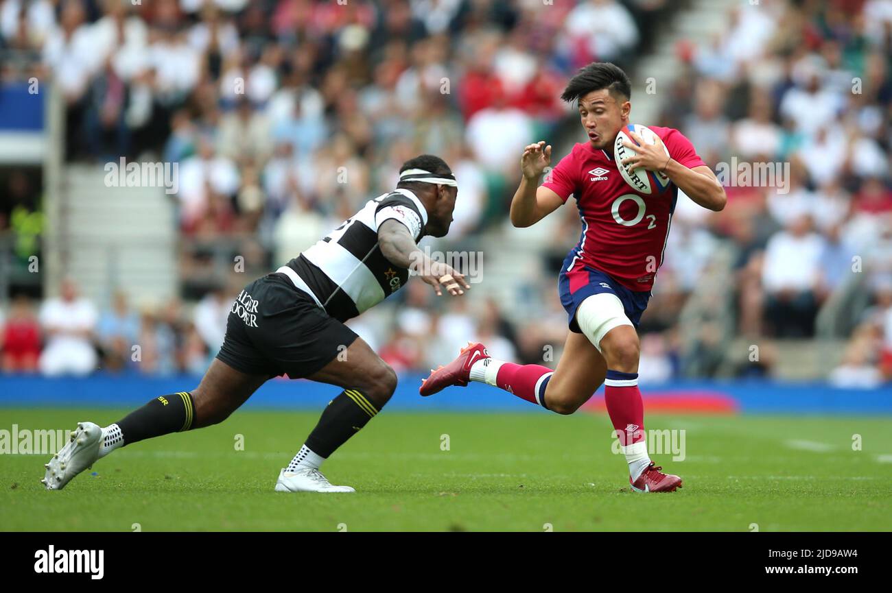 EnglandÕs Marcus Smith is tackled by Barbarians' Levani Botia during the International Friendly match at Twickenham Stadium, London. Picture date: Sunday June 19, 2022. Stock Photo