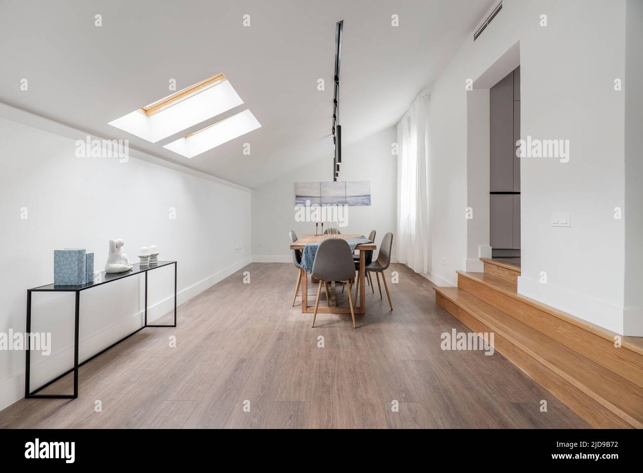 15 Pro Tips to Make Sloped Ceilings Look Incredibly Intentional - Textured Apartment Ceiling With Skylights