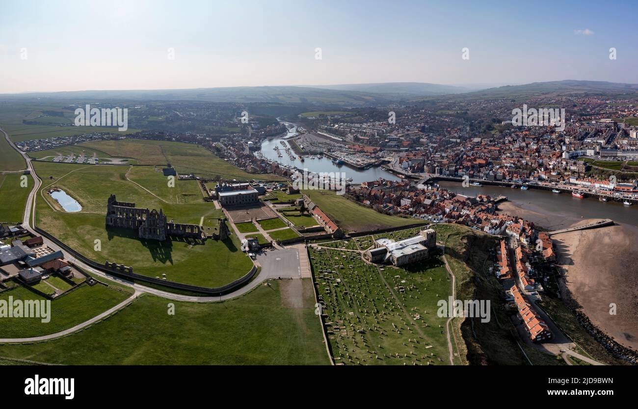 Elevated panorama of Whitby harbour town abbey and church headland Stock Photo