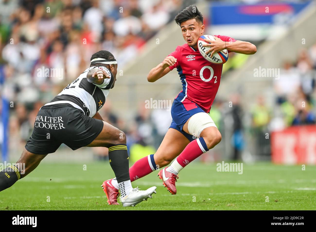 Marcus Smith of England evades the tackle of Levani Botia of Barbarians in ,  on 6/19/2022. (Photo by Craig Thomas/News Images/Sipa USA) Stock Photo