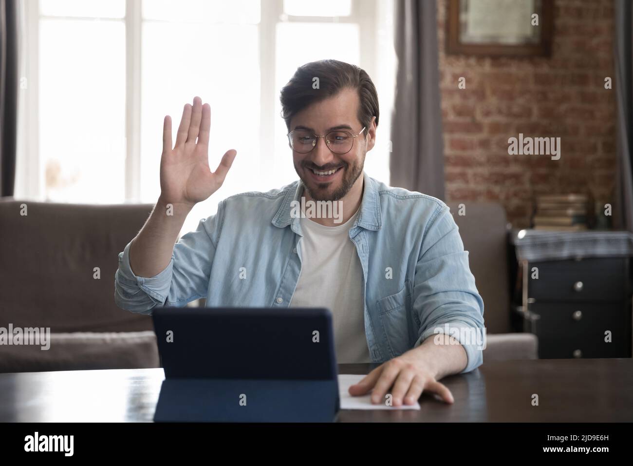 Man make video call communication use digital tablet Stock Photo