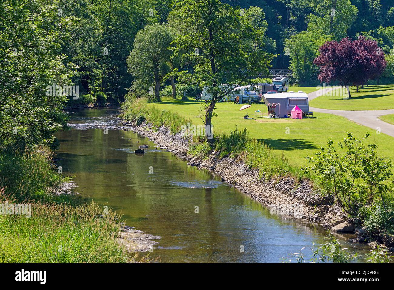 Campsite at riverbank. river Our in Our valley, Vianden, canton of Vianden, Grand Duchy of Luxembourg, Europe Stock Photo