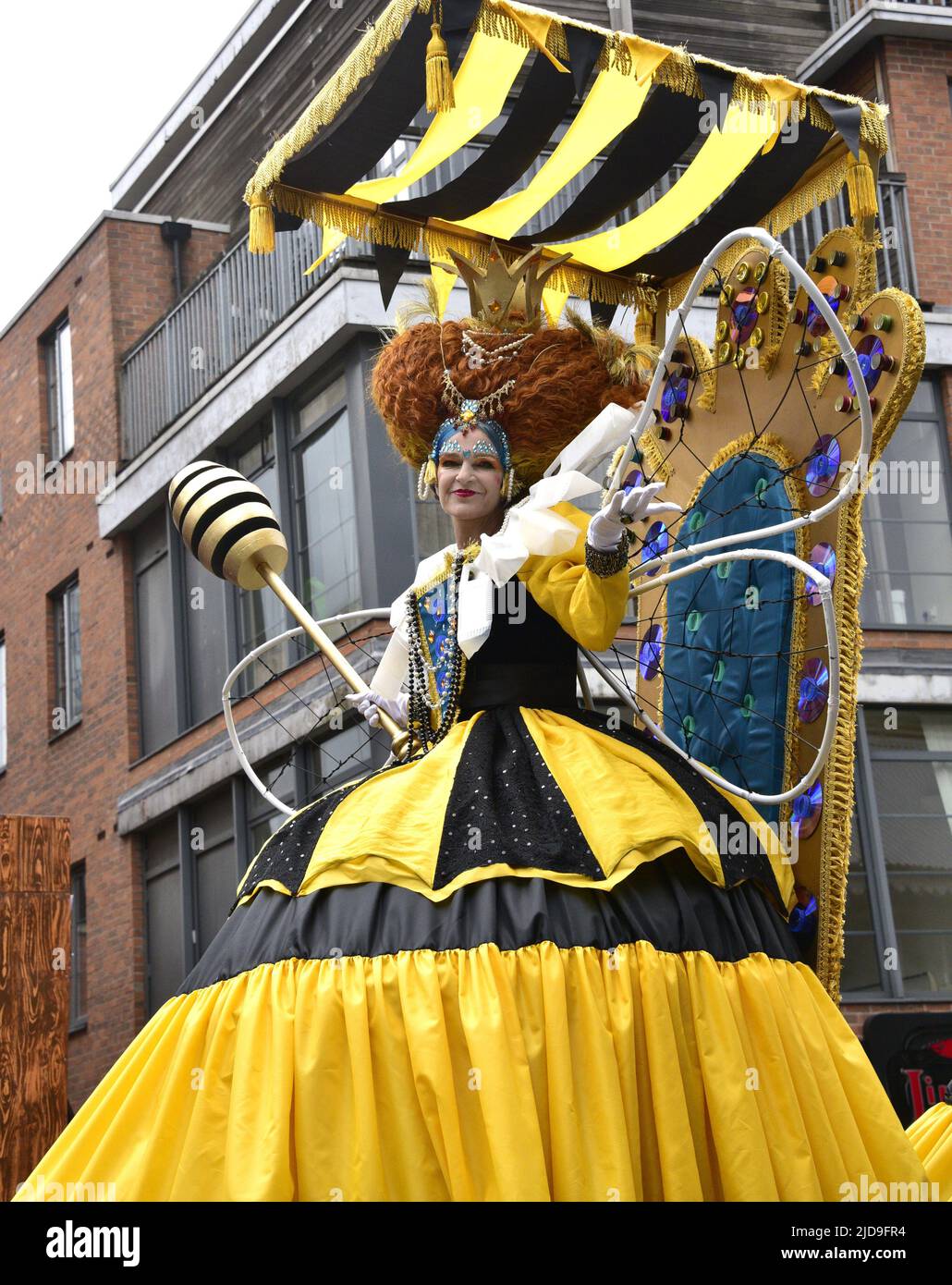 Manchester, UK, 19th June, 2022. The Queen Bee float. Performers and artists take part in the Manchester Day Parade, Manchester, England, United Kingdom. Organisers say: 'Over 1,500 performers and artists from local communities bring Manchester city centre to life in a fantastic display of colour, sound and movement. An audience of more than 60,000 are wowed by the incredible day of amazing structures, vibrant costumes and pulsating music and dance'. Credit: Terry Waller/Alamy Live News Stock Photo