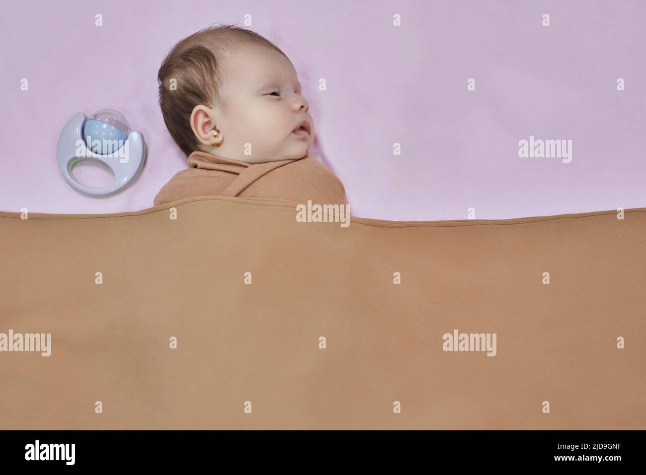 Newborn baby girl, sleeping on a blanket Stock Photo Alamy