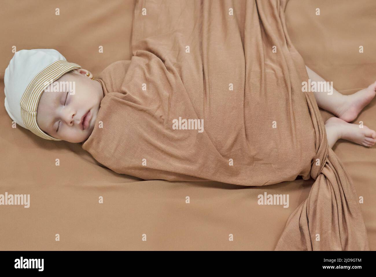 Newborn baby girl, sleeping on a blanket Stock Photo Alamy