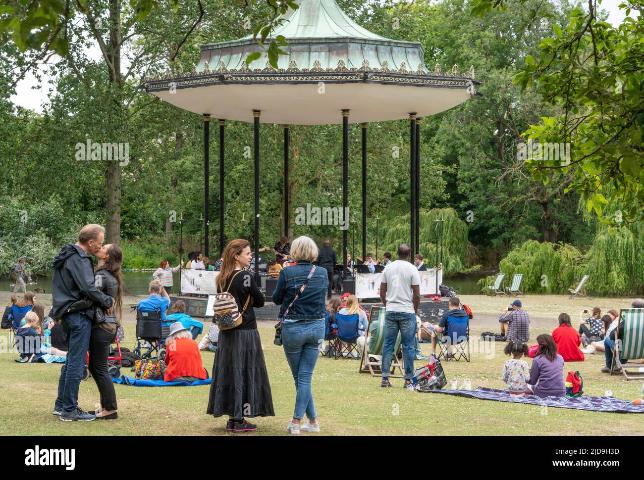 Regent's Park, London, UK. 19th June 2022. Crowds enjoy the National Youth Jazz Orchestra (NYJO) surrounding the Bandstand in the Regent's Park, central London, on June 19, 2022. The Festival continues on Sundays and Bank Holidays until September 2022. Credit: Rob Taggart/Alamy Live News Stock Photo
